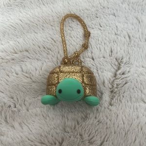 Hand sanitizer holder